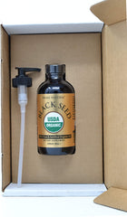 Virgin unrefined liquid texture of PRIME NATURAL black seed oil.