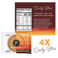 Protein Puck bar in hand for quick on the go snacking