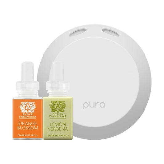 Pura 4 diffuser on table delivers even fragrance for a cozy room.