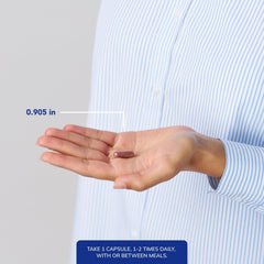 Pure Encapsulations Acai 600 capsules in hand, portable daily antioxidant support