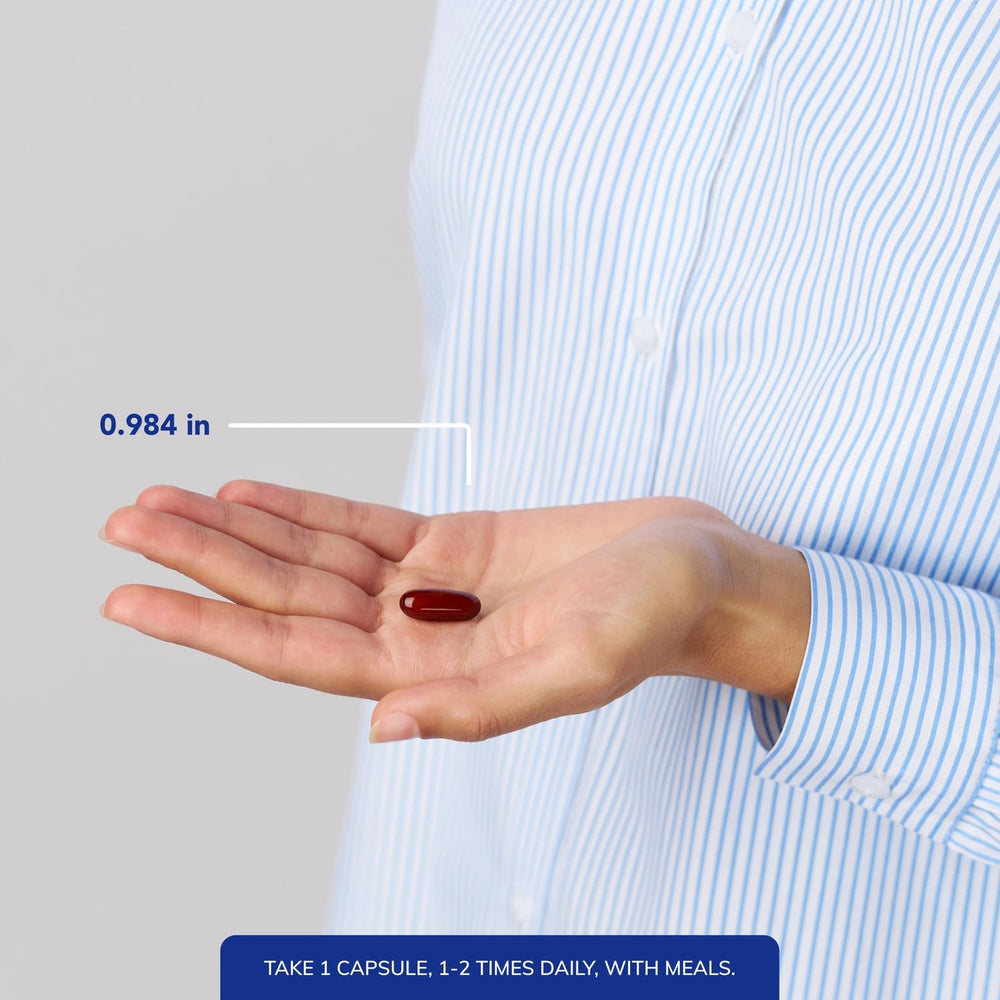 Pouring Ubiquinol capsules from the bottle for easy daily use with meals