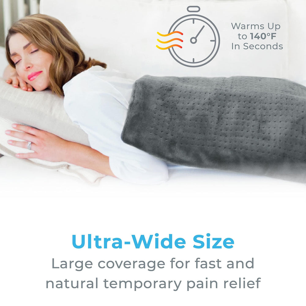 Pure Enrichment PureRelief shown on bed for full back and leg comfort during relaxation.