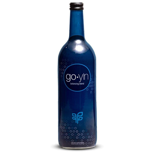 PURE GoYin bottle on table promoting daily balance and wellness.