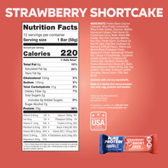 Pure Protein AMMMAZE Strawberry Shortcake bars cross-section reveals creamy coating and crunchy topping.