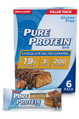 Pure Protein Chocolate Salted Caramel bar on gym mat after workout for quick energy