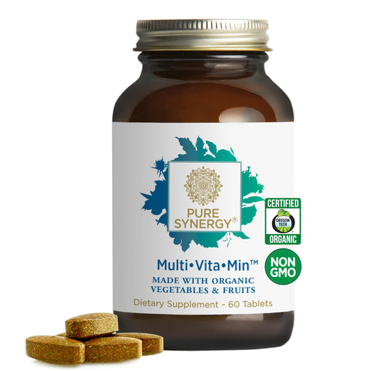 PURE SYNERGY Multi-Vita-Min bottle close-up with vegan capsules for daily energy
