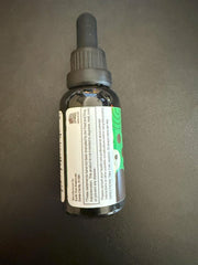 Pure Wellness packaging and label showcasing organic, non-GMO, vegan formula