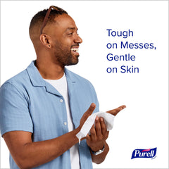 Purell hand sanitizing wipes canister back label shows ingredients and usage claims.