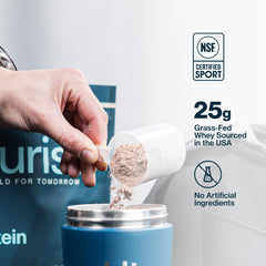 Athlete preparing a PURIST REP Whey Vanilla shake after workout.
