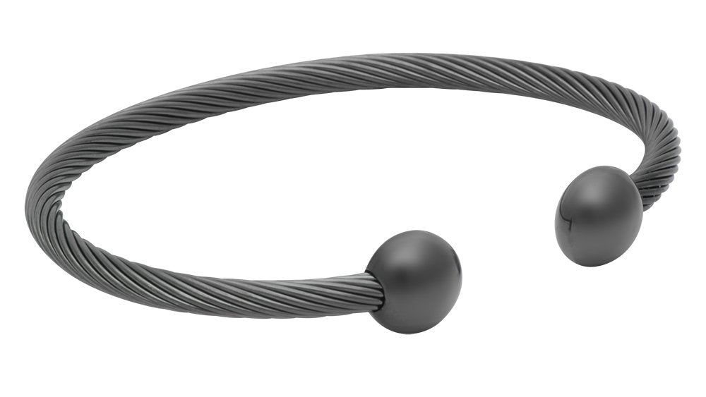 QRAY Gun Metal Deluxe bracelet pairs with sport attire as a versatile wellness accessory.