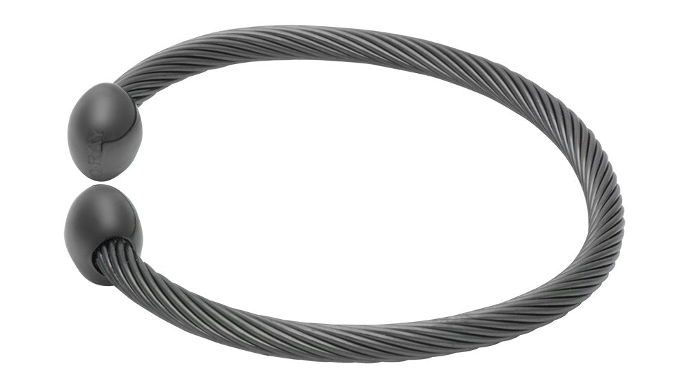 QRAY Gun Metal Deluxe bracelet worn during hiking illustrates an active lifestyle accessory.