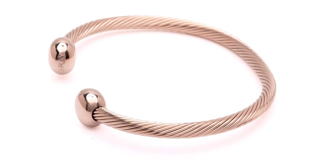 QRAY Rose Gold Deluxe bracelet in golf action captures focus during swing