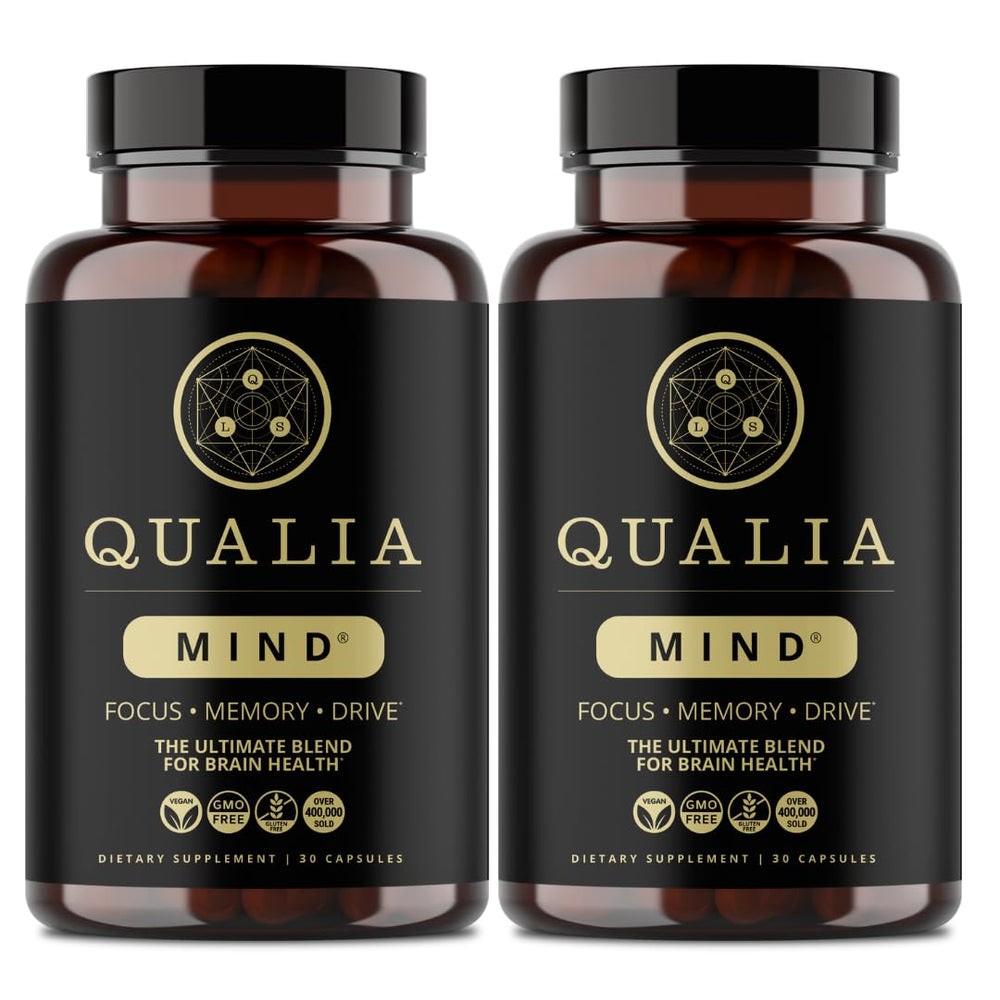 Qualia Mind bottle label closeup highlighting premium brain nutrients for focused work.
