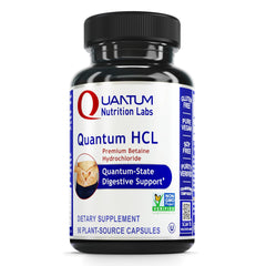 Quantum Nutrition Betaine HCl bottle with plant-based capsules for post-meal support.