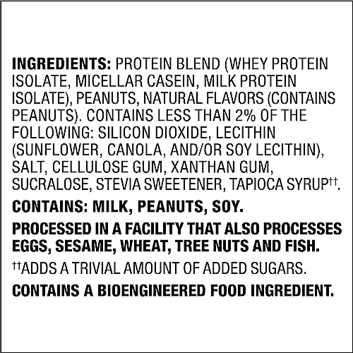 Quest Peanut Butter Protein Powder being poured into a mug