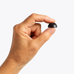 Glass of water with QuietLab N1 gummies for easy intake.
