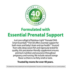 Mother-to-be taking Rainbow Light Prenatal DHA softgel as part of routine.