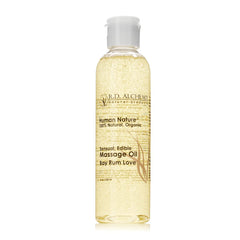 RD Alchemy Bay Rum Love bottle with silky edible massage oil for romantic moments.