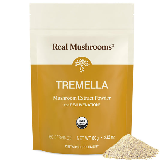 Real Mushrooms Tremella powder bottle on kitchen counter, ready to mix.