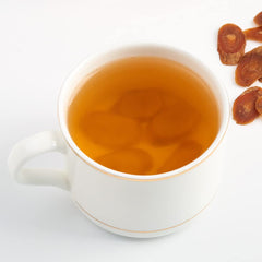 Brewing Red Ginseng Slices into tea for warm, comforting moments.