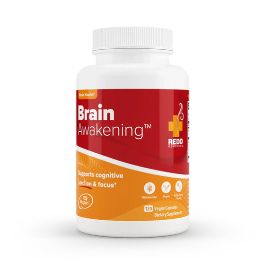 Redd Remedies Brain Awakening bottle on a desk for daily focus.