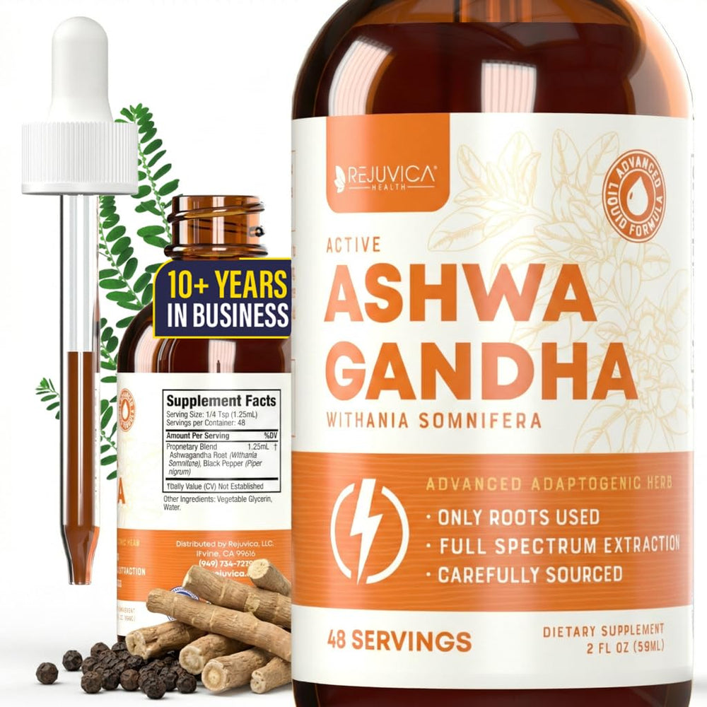 Rejuvica Health Active Ashwagandha packaging box beside glass of water for daily wellness.