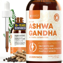 Rejuvica Health Active Ashwagandha packaging box beside glass of water for daily wellness.