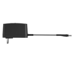 ResMed AirMini power supply connected to AirMini device for seamless use.