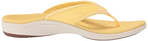 REVITALIGN Yumi yellow quick-dry lining detail for travel wear.