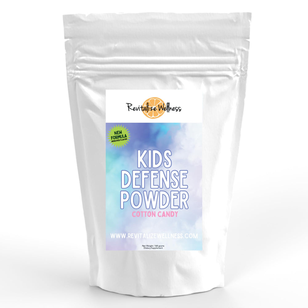 Revitalize Wellness Kid's Defense powder label on the tub highlights vitamin C and B3 benefits.