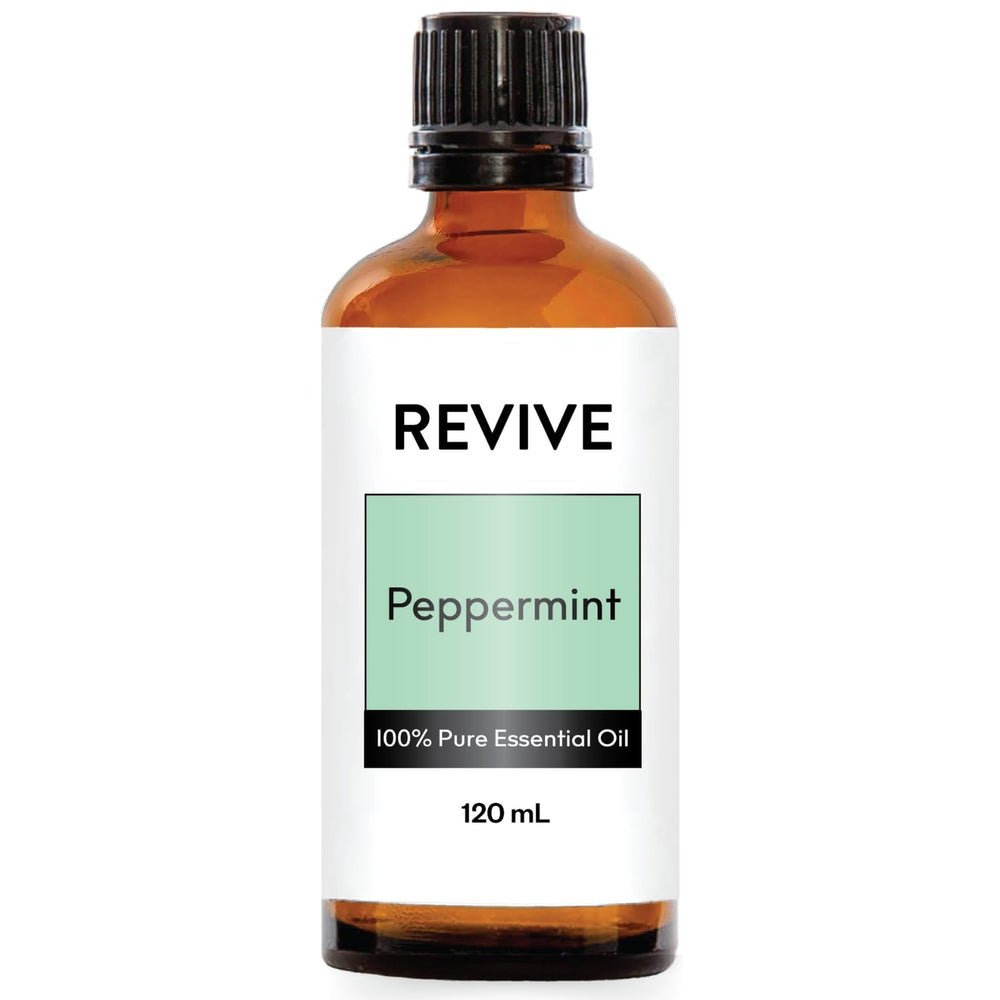 REVIVEEO Peppermint Essential Oil bottle closeup for refreshing aromatherapy sessions.
