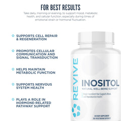 Revive MD Inositol bottle on counter beside a glass of water.