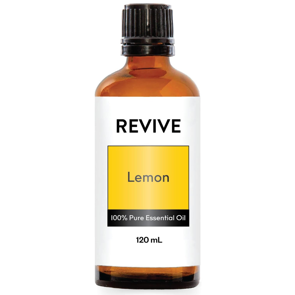REVIVEEO Lemon essential oil bottle pour for refreshing room fragrance.