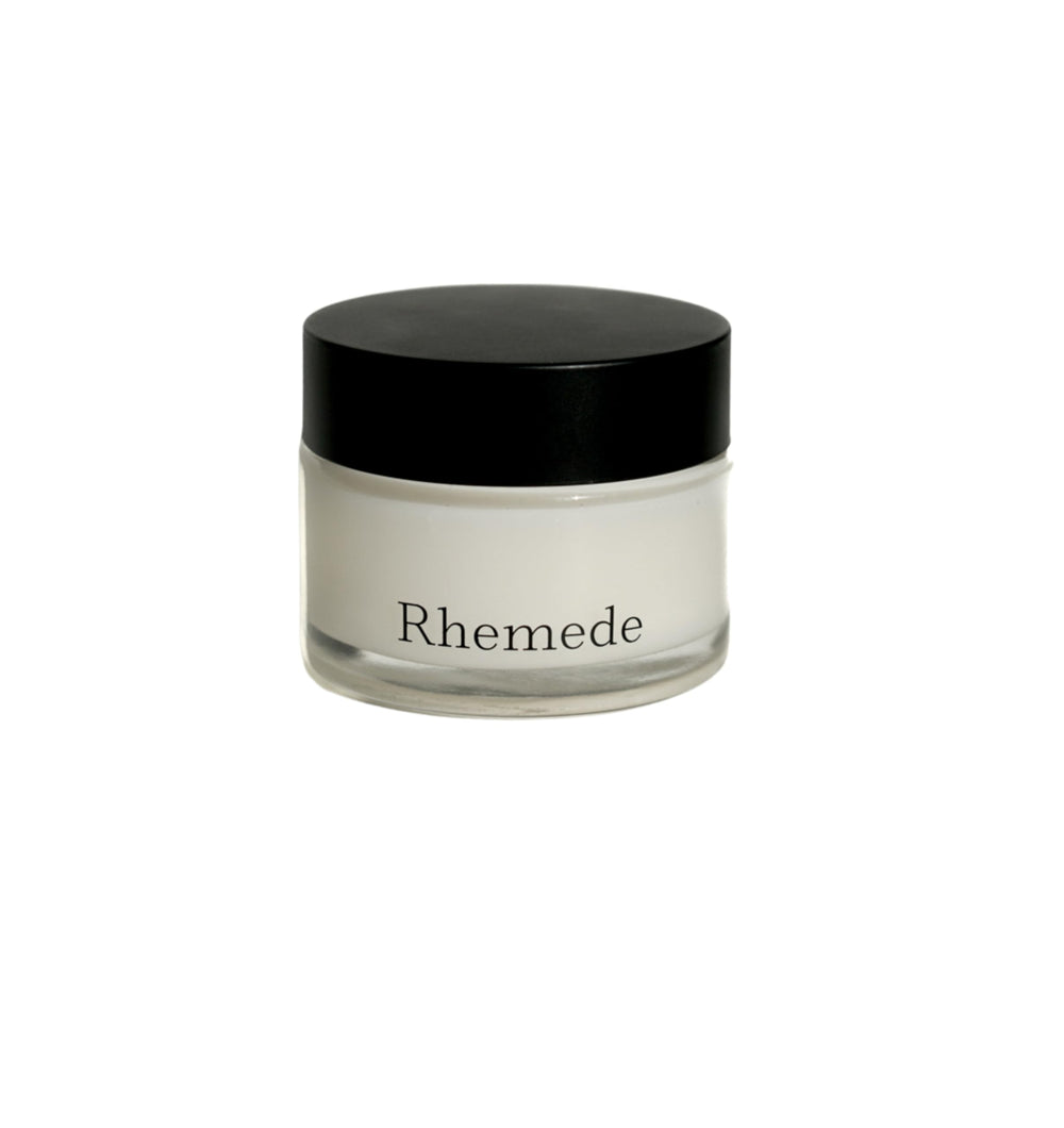 Rhemede Restoration Balm jar close-up displaying soothing skin-quality texture