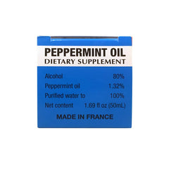 Ricqles Peppermint Oil bottle tilted for easy access, inviting daily use for digestive ease.