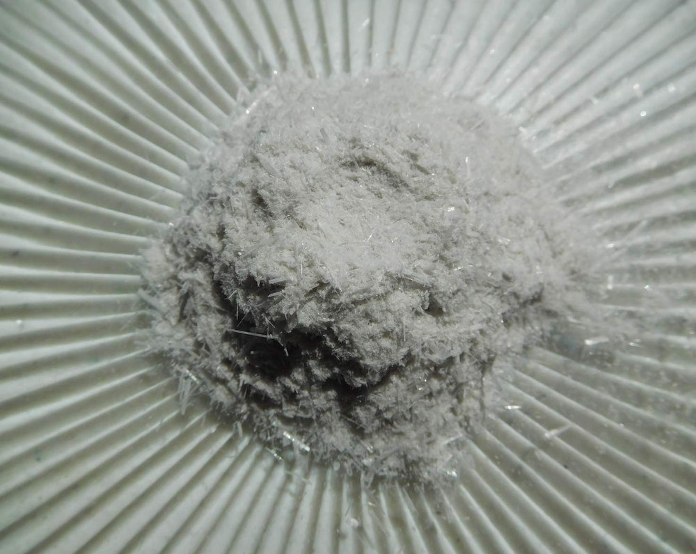 Rise Perspective Selenite Powder in a resealable bag for cleansing and crystal care.