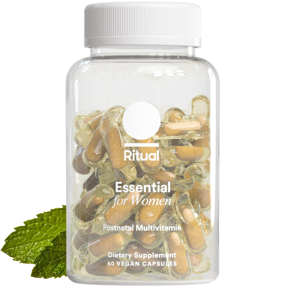Ritual Essential Postnatal Multivitamin bottle close-up highlighting omega-3 DHA and vegan formula