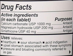 Rolaids Mixed Berry tablets being poured, ready for gas relief.