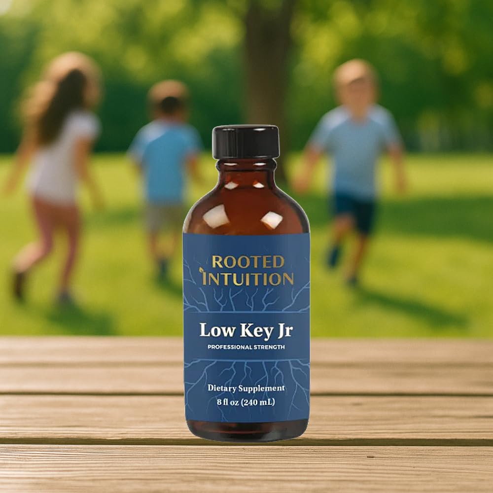 Rooted Intuition Low Key Jr bottle being poured for calm focus