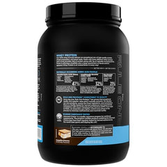 Rule 1 Whey Protein label close-up highlights 24g per serving.