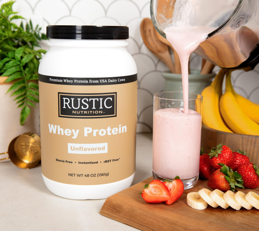 Rustic Nutrition Premium Whey Protein tub back label highlighting USA-sourced milk