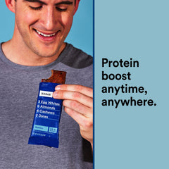 RXBAR Blueberry bar in hand during a quick break