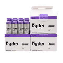 RYDE Sleep 2oz bottle on nightstand for quick relaxation.