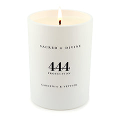 Close-up of Sacred Divine 444 candle showing soy coconut wax quality.