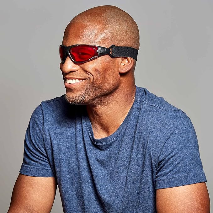 Close-up of SafetyBlue red night glasses showing red light blocking lenses