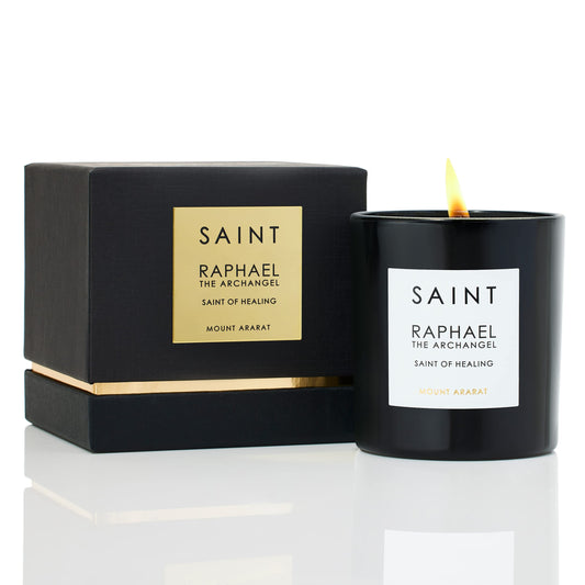 Saint Raphael Archangel Candle in a glass jar, calming glow for any space.