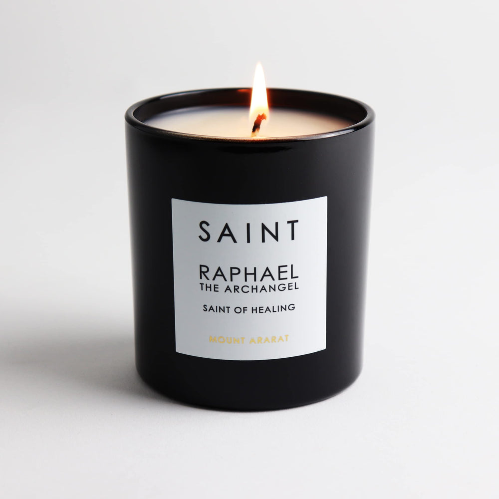 Saint Raphael prayer coin inside wax, a meaningful keepsake for reflection.