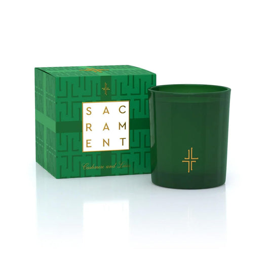 SAINT X Ali Landry Sacrament Candle in green cross-motif vessel elevates meditation spaces