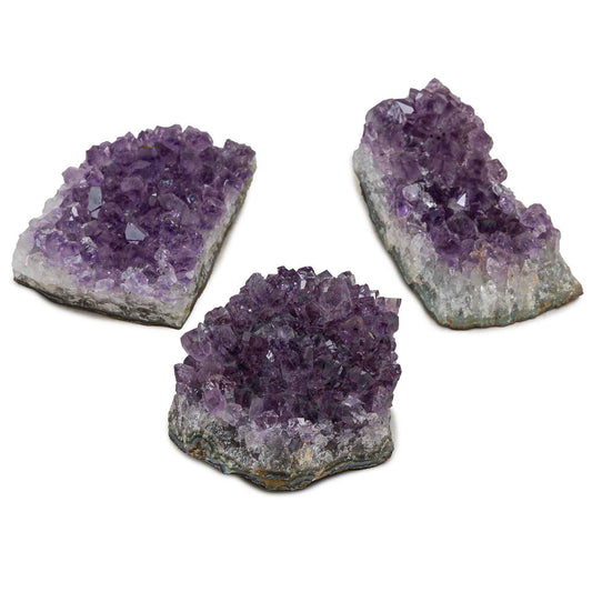 SAMSARI amethyst druzy cluster close-up showing violet sparkle for meditation ambiance.