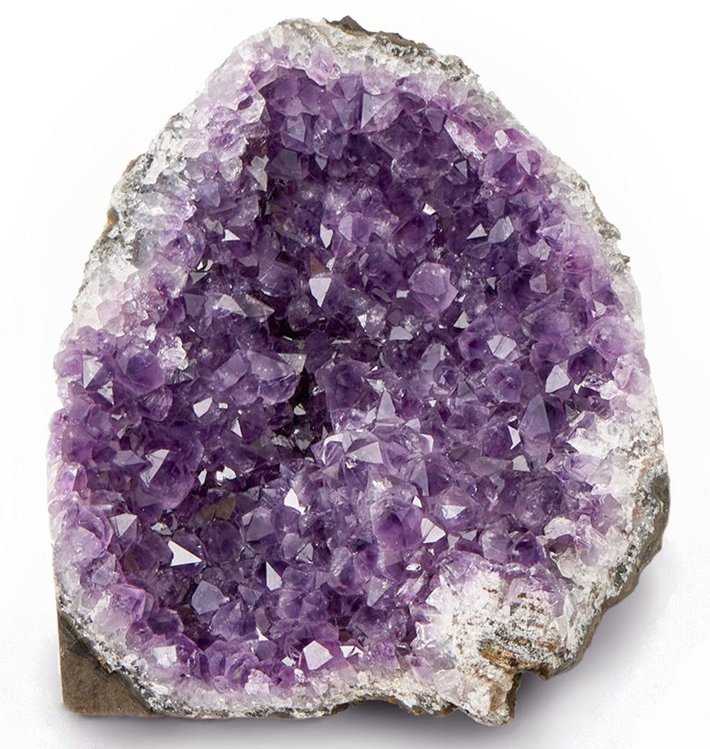 SAMSARI amethyst geode shows purple hues, enhances meditation spaces.